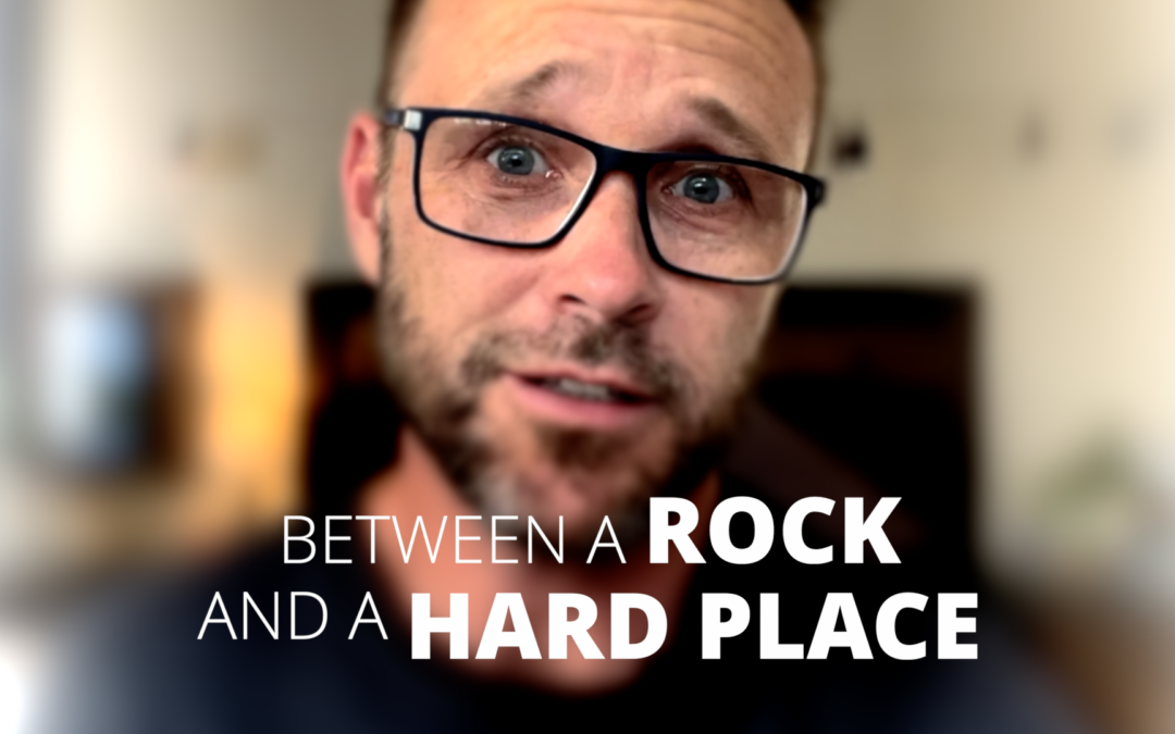BETWEEN A ROCK AND A HARD PLACE